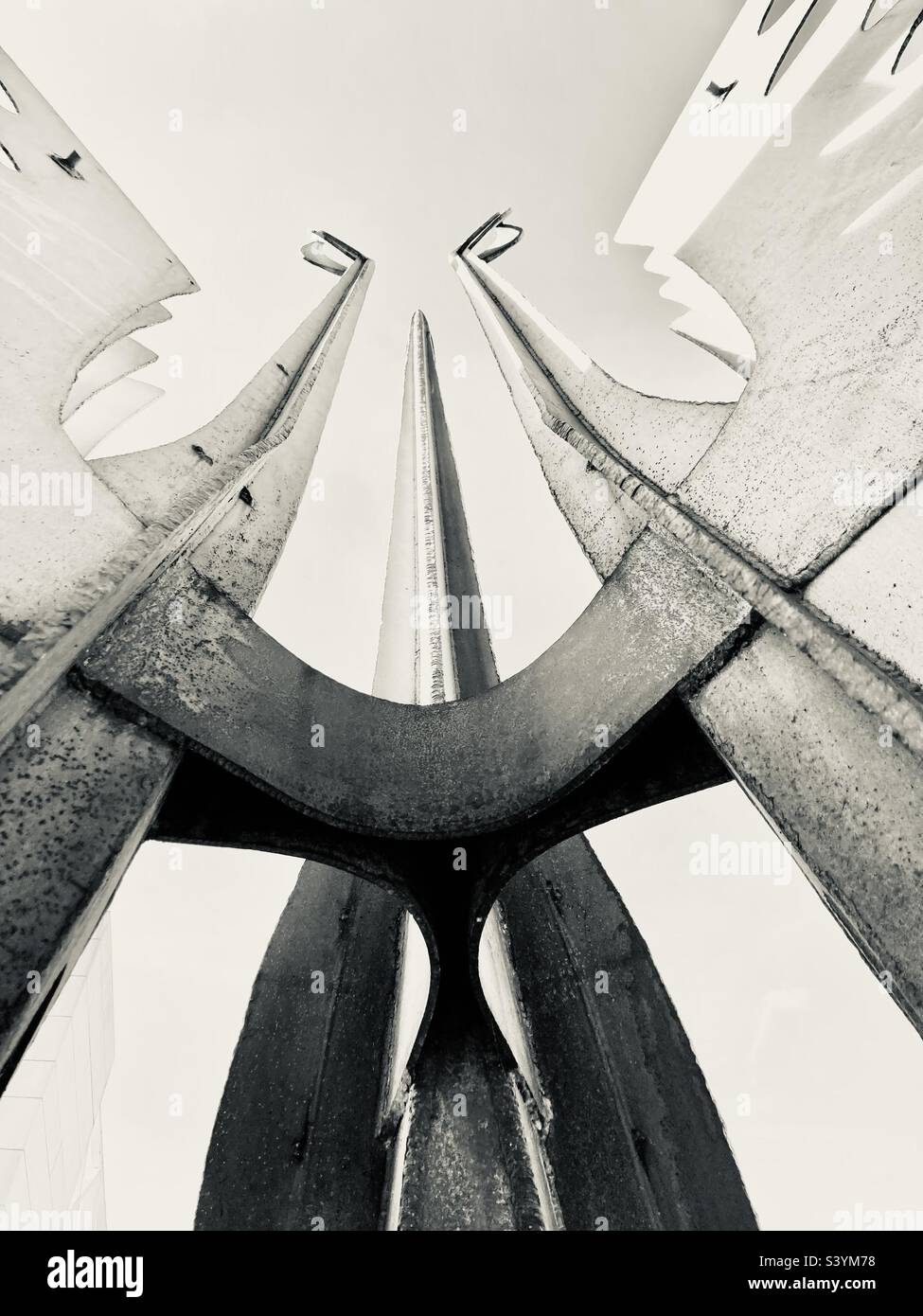 Perspective- looking up from under a bid-like steel sculpture. - Smartphone Captured Stock Image