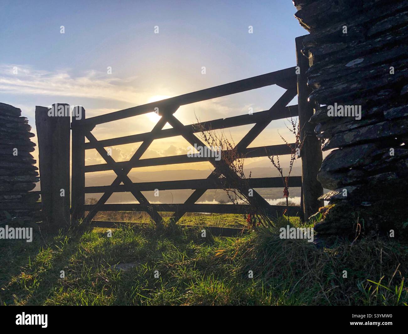 Silhouetted wooden farm gate hi-res stock photography and images - Alamy