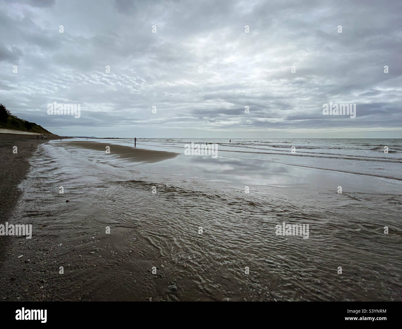 Atmospheric early autumn weather on Seaton beach, Cornwall - Smartphone Captured Stock Image