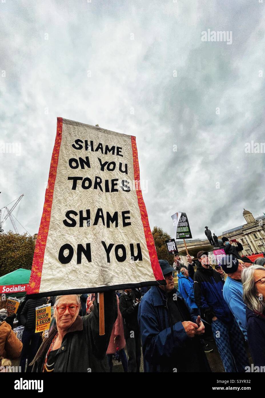 Banner says: “Shame on you Tories” in Trafalgar Square, London, during protest march 5th November 2022 against Government austerity economic policies as demonstrators call for a General Election Now - Smartphone Captured Stock Image