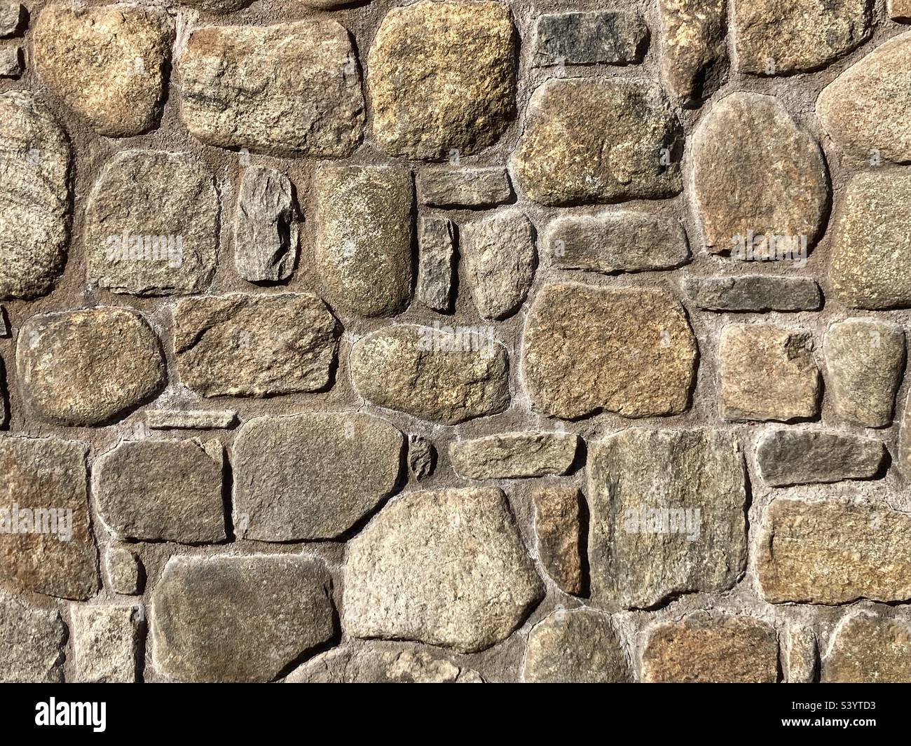 Stonewall with lots of texture, made from rocks - Smartphone Captured Stock Image