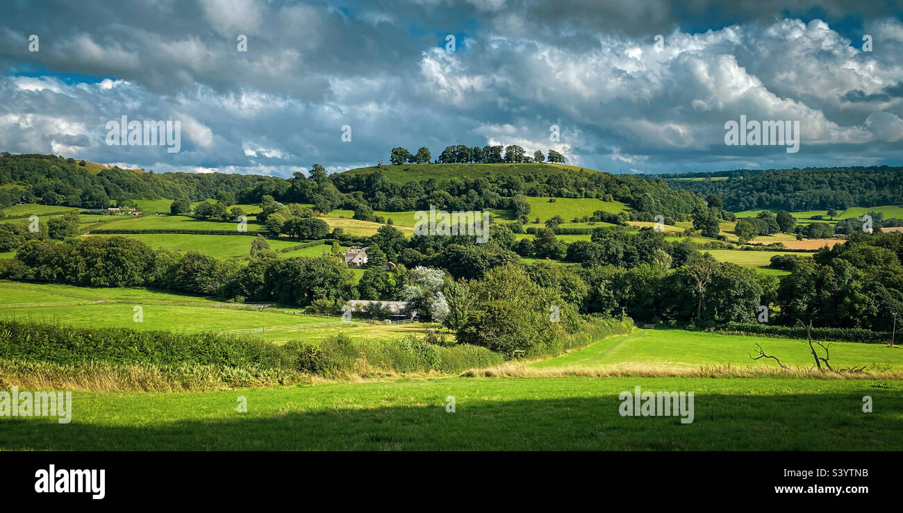 Idyllic summer Cotswold escarpment Gloucestershire landscape. A mobile phone photo with some phone or tablet post processing. - Smartphone Captured Stock Image