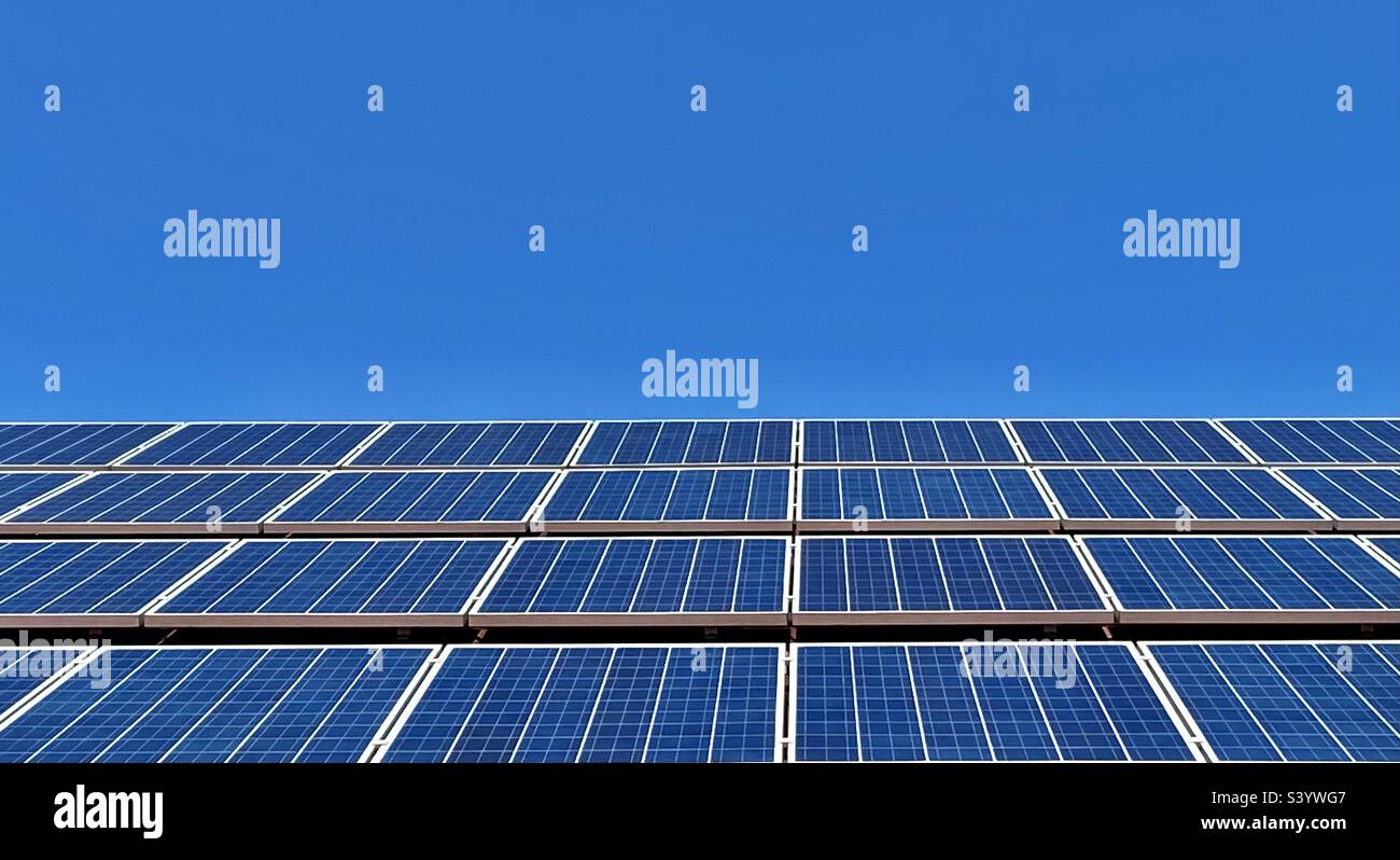 Solar panels against blue sky - Smartphone Captured Stock Image