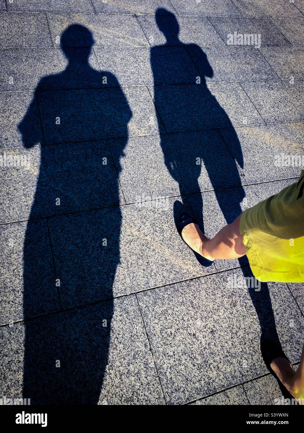 A couple of walking shadows - Smartphone Captured Stock Image