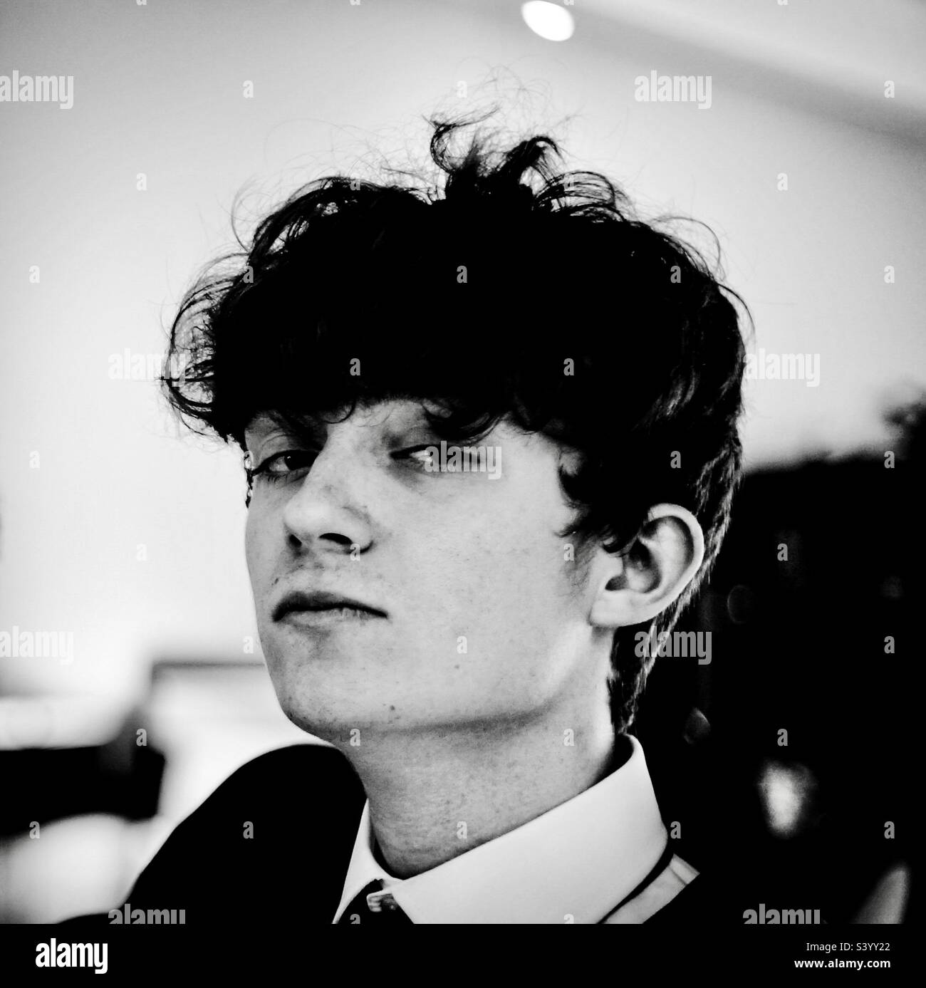 Young man looking confident in black and white. - Smartphone Captured Stock Image