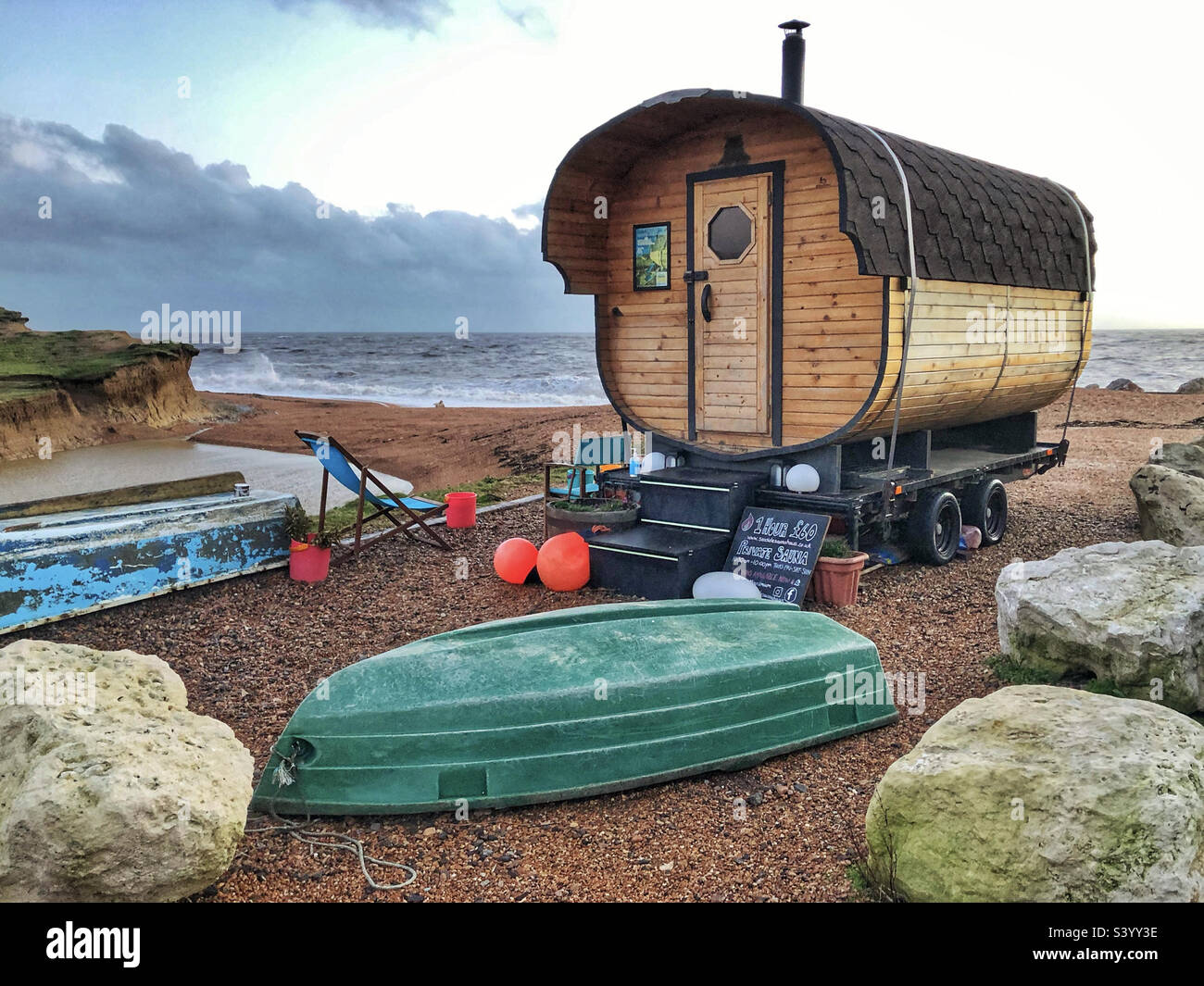Private Sauna on Seatown beach in November, Bridport, Dorset - Smartphone Captured Stock Image