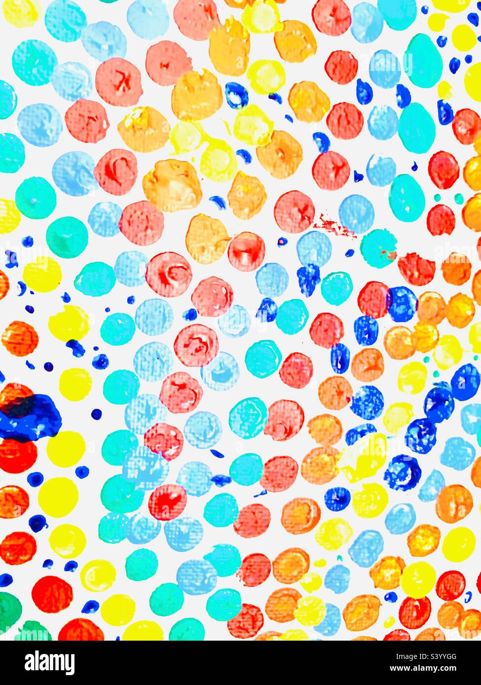 Bright colorful polka dot background with; pink, red, orange, blue, yellow and green - Smartphone Captured Stock Image