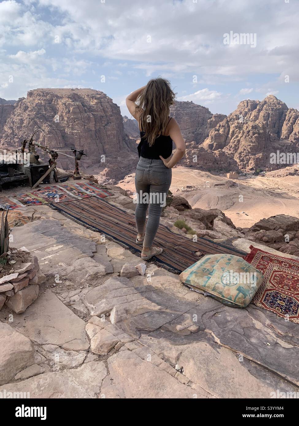 Woman at the top of mountain in Petra - Smartphone Captured Stock Image