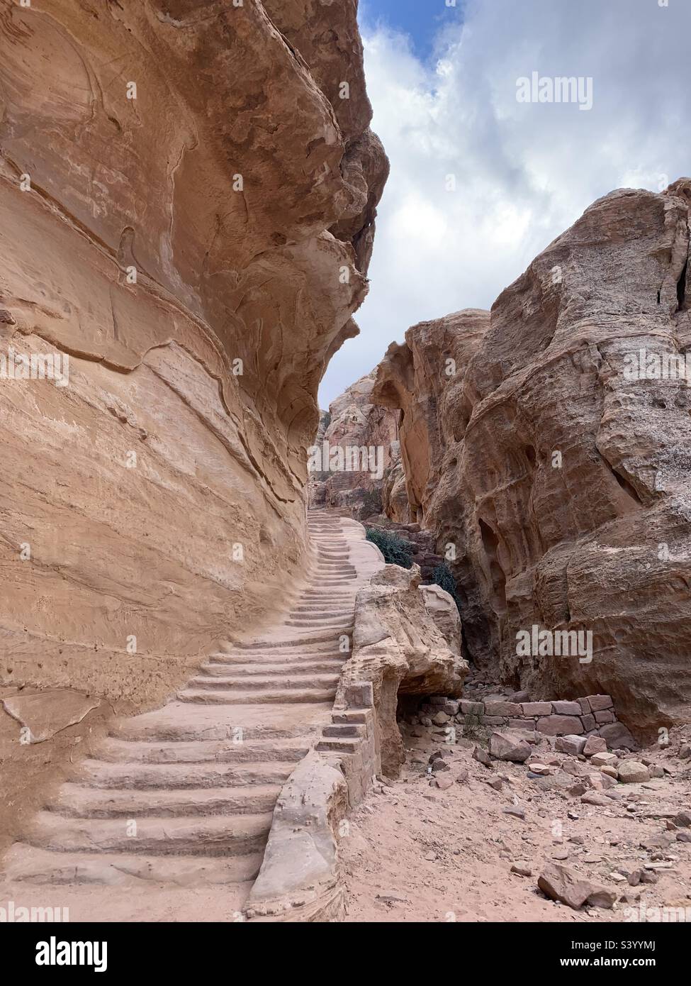 Stone staircase up to high place of sacrifice Petra Stock Photo