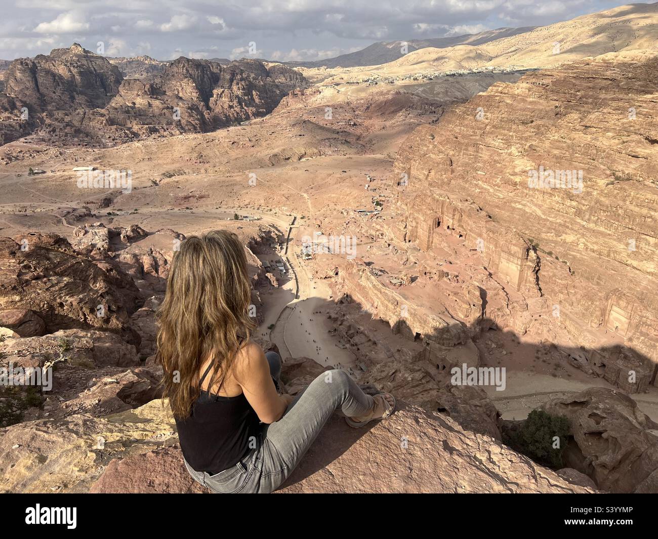Woman enjoying view at high place of sacrifice Petra Stock Photo