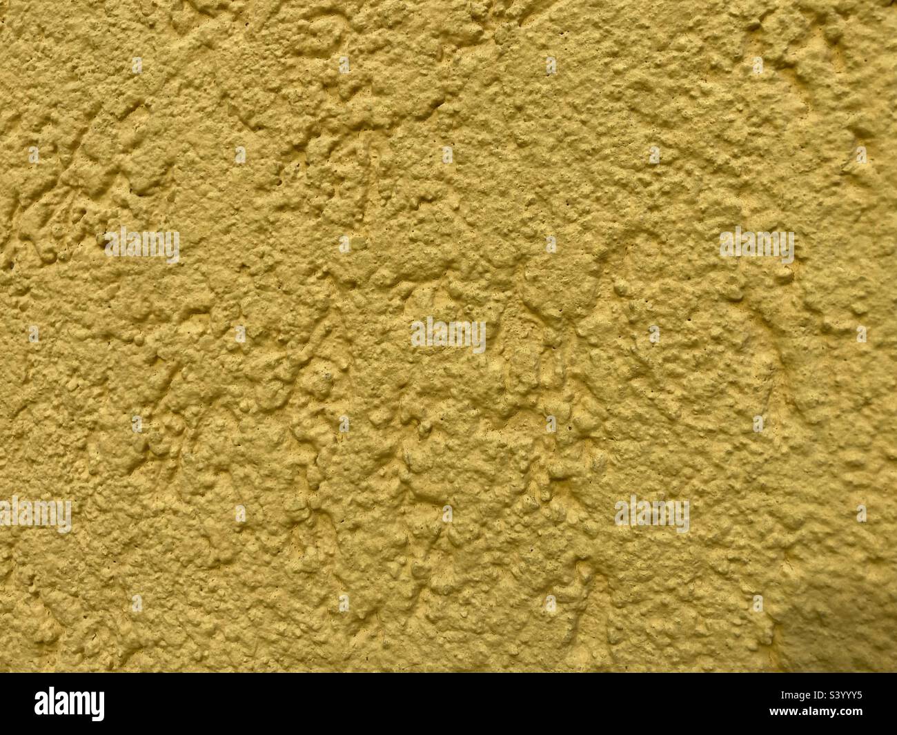 a yellow uneven rough surface Stock Photo