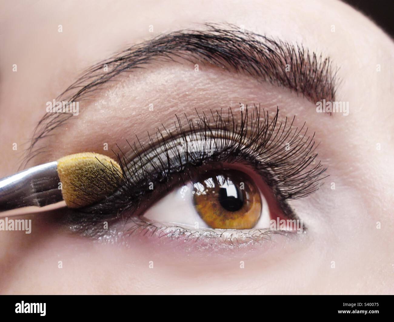 Makeup applying - Smartphone Captured Stock Image