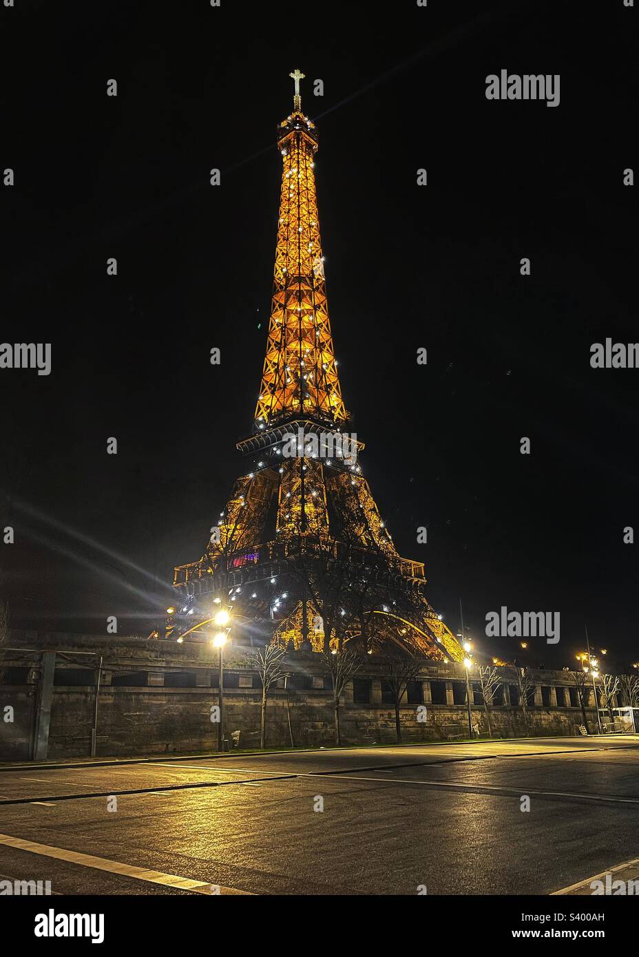 Eiffel Tower at night illumination from the Seine River bank Paris, France - Smartphone Captured Stock Image