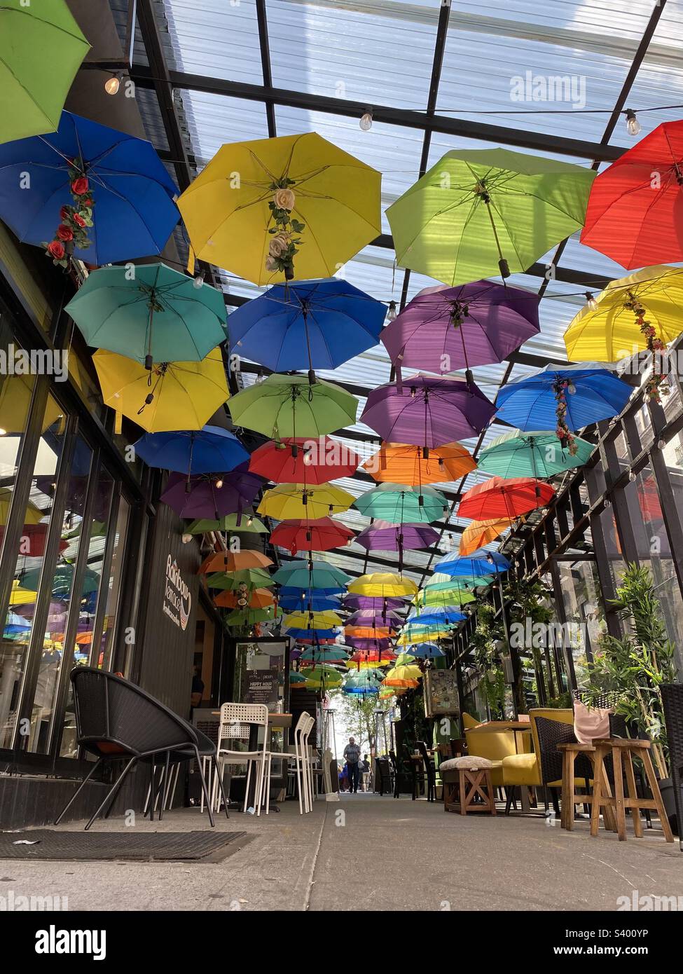 Colorful streets decorated with colorful umbrellas in Colombia - Smartphone Captured Stock Image