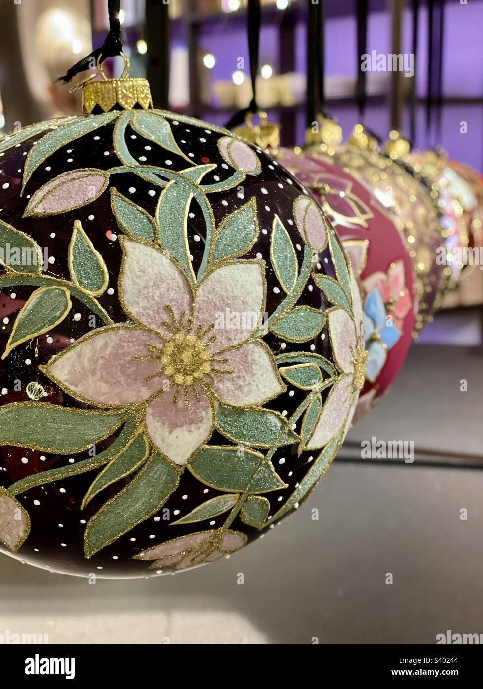 Hand painted glass Christmas trees balls seen in perspective Stock Photo Alamy