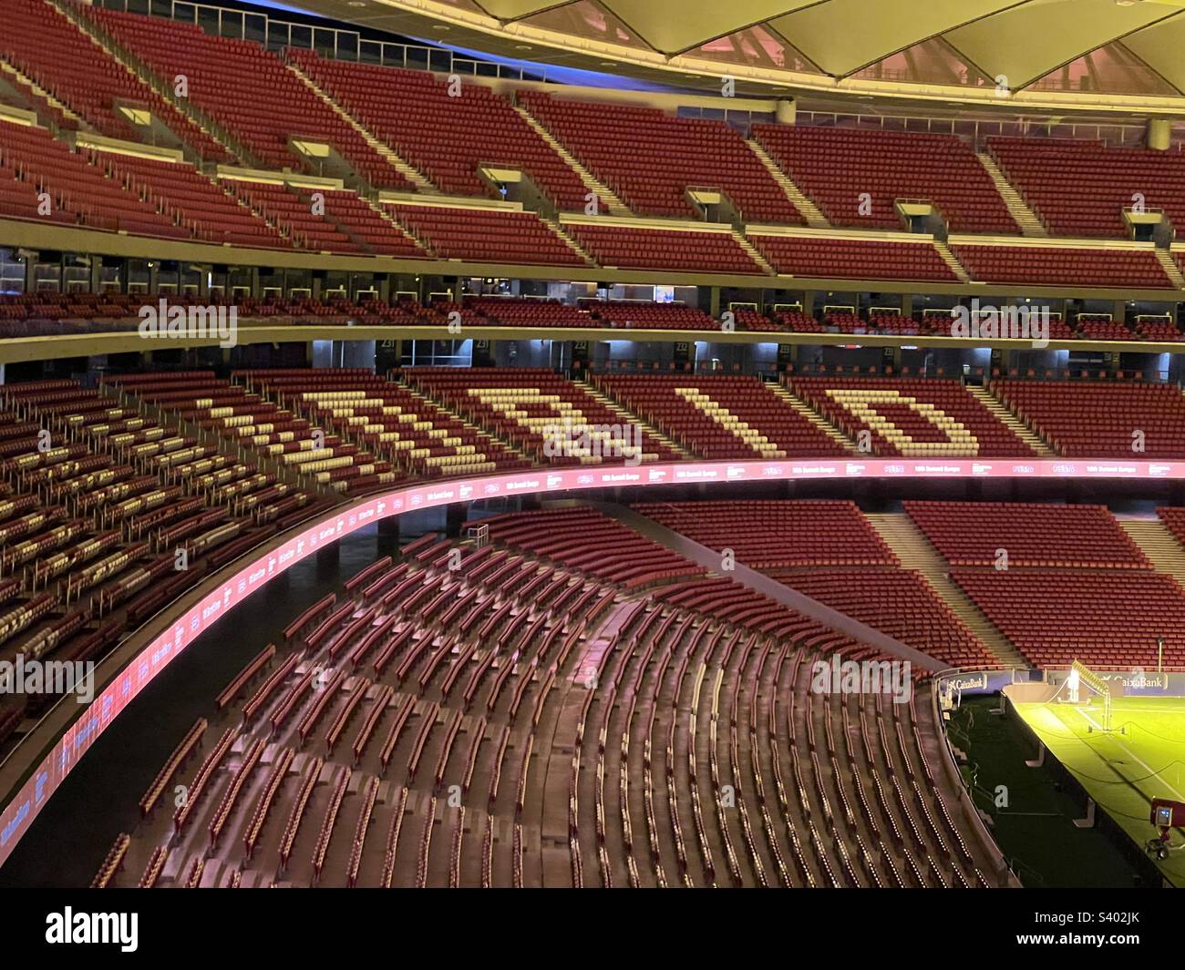 Inside the Empty Metropolitano Stadium (Cívitas Metropolitano) in Madrid, Spain at night. The home of Atlético Madrid football club Stock Photo