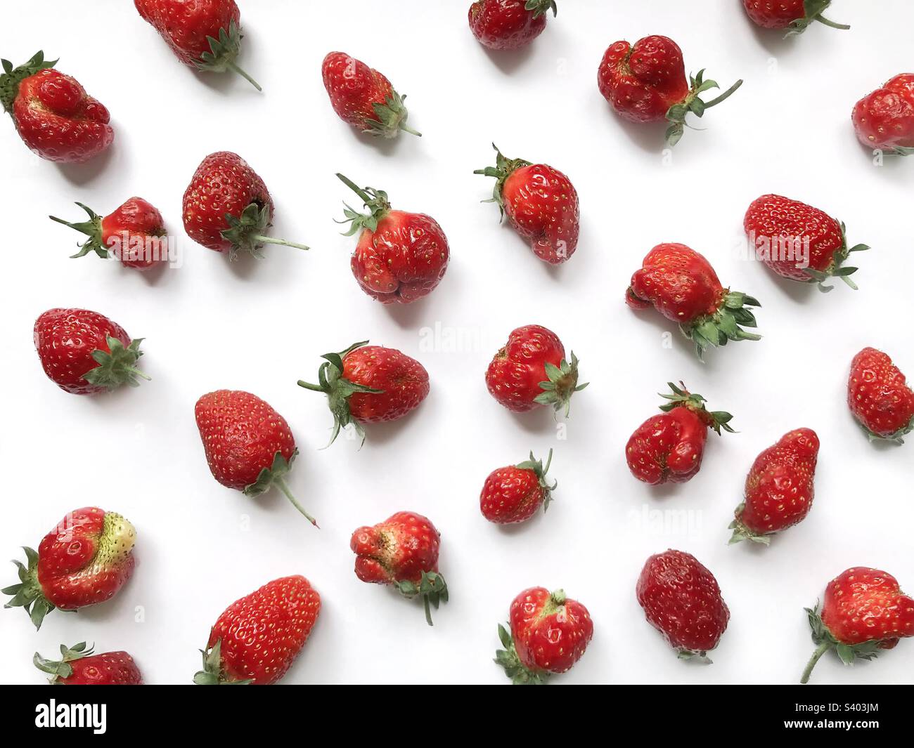 Red ripe strawberries on white background Stock Photo - Alamy