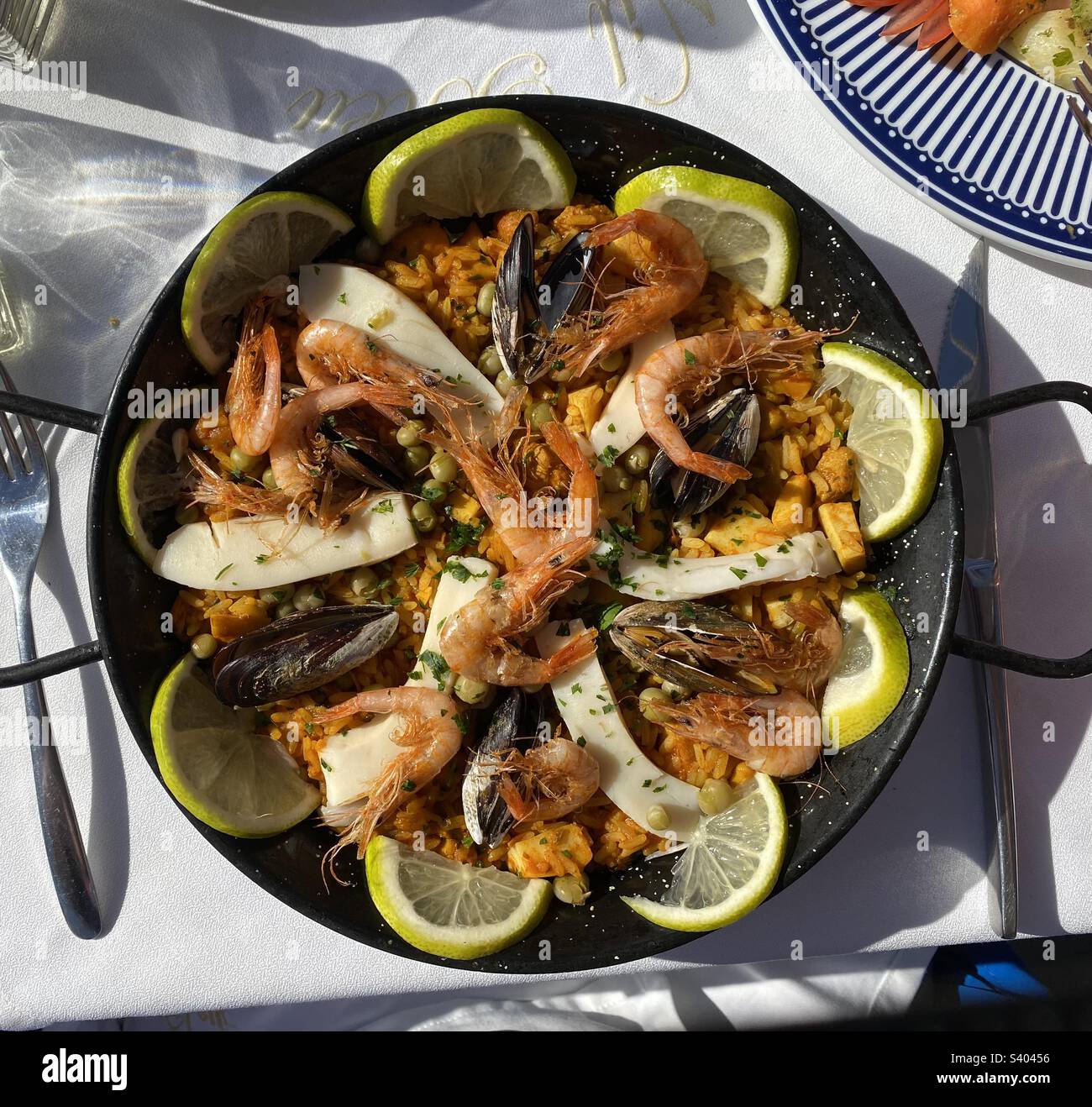 Seafood Paella with prawns,mussels and squid Stock Photo Alamy