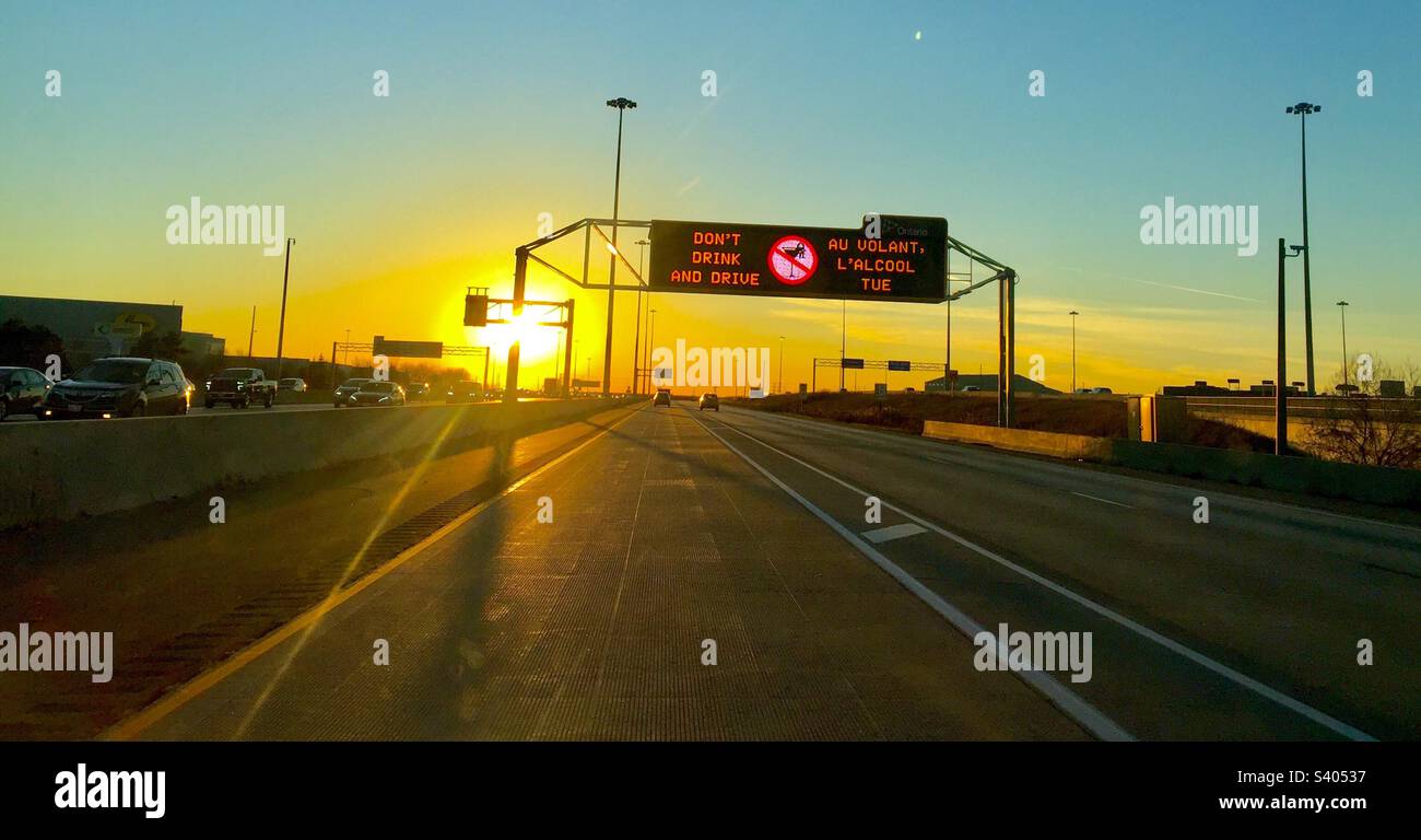 Don’t Drink and Drive message across a motorway, Ontario, Canada. Late afternoon. Stock Photo
