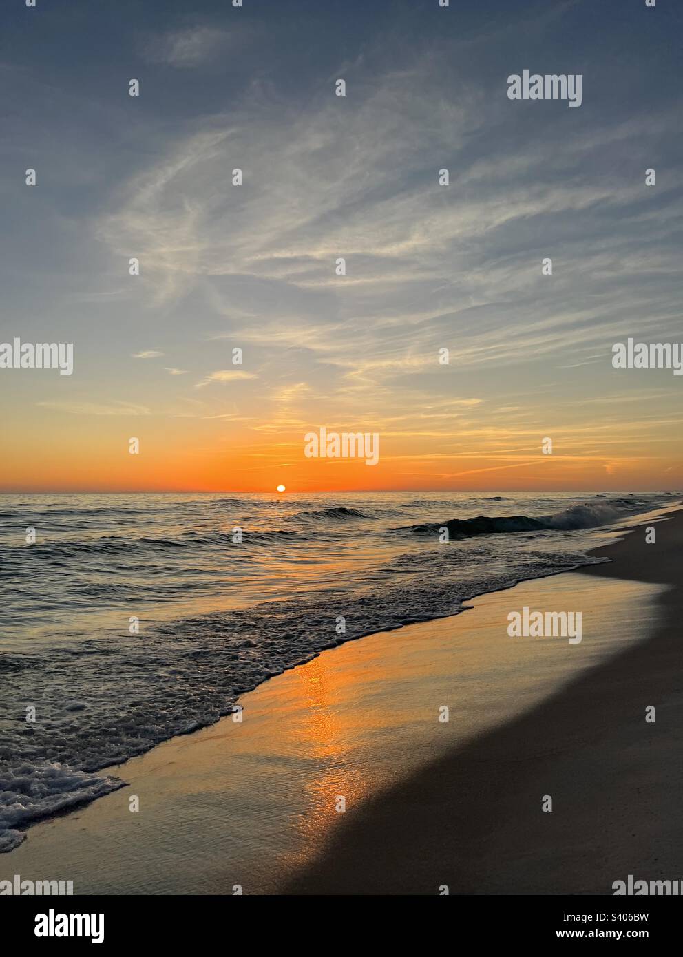 Golden sunset over the Gulf of Mexico Florida Emerald Coast - Smartphone Captured Stock Image
