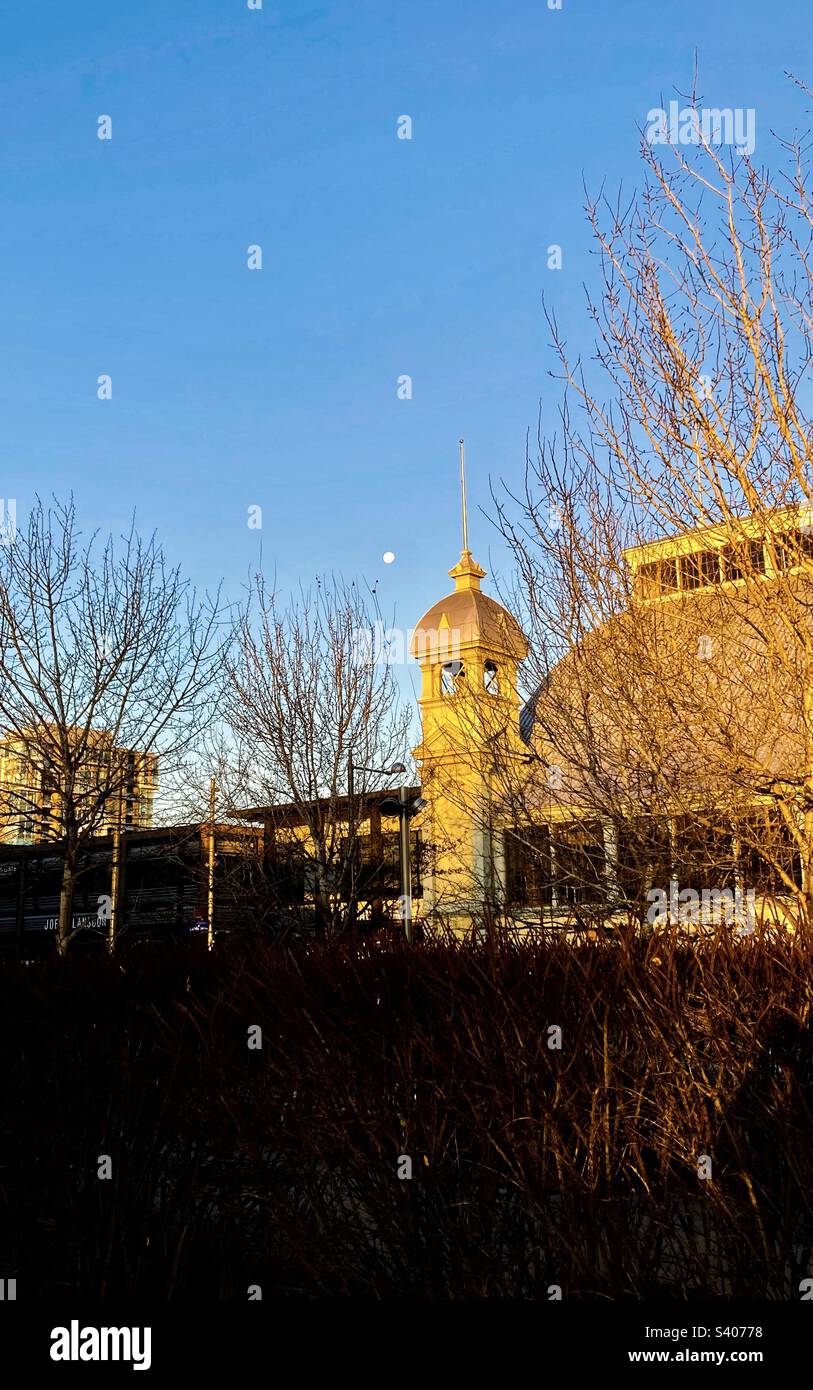 Sunrise with a morning moon over the Aberdeen Pavilion. - Smartphone Captured Stock Image