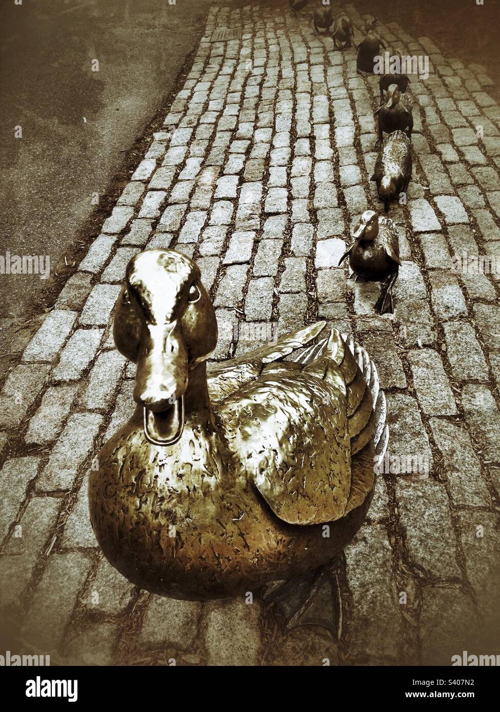 Boston, Massachusetts, USA - Make Way for Ducklings bronze sculpture found in Boston Public Garden. Inspired by children’s picture book. - Smartphone Captured Stock Image