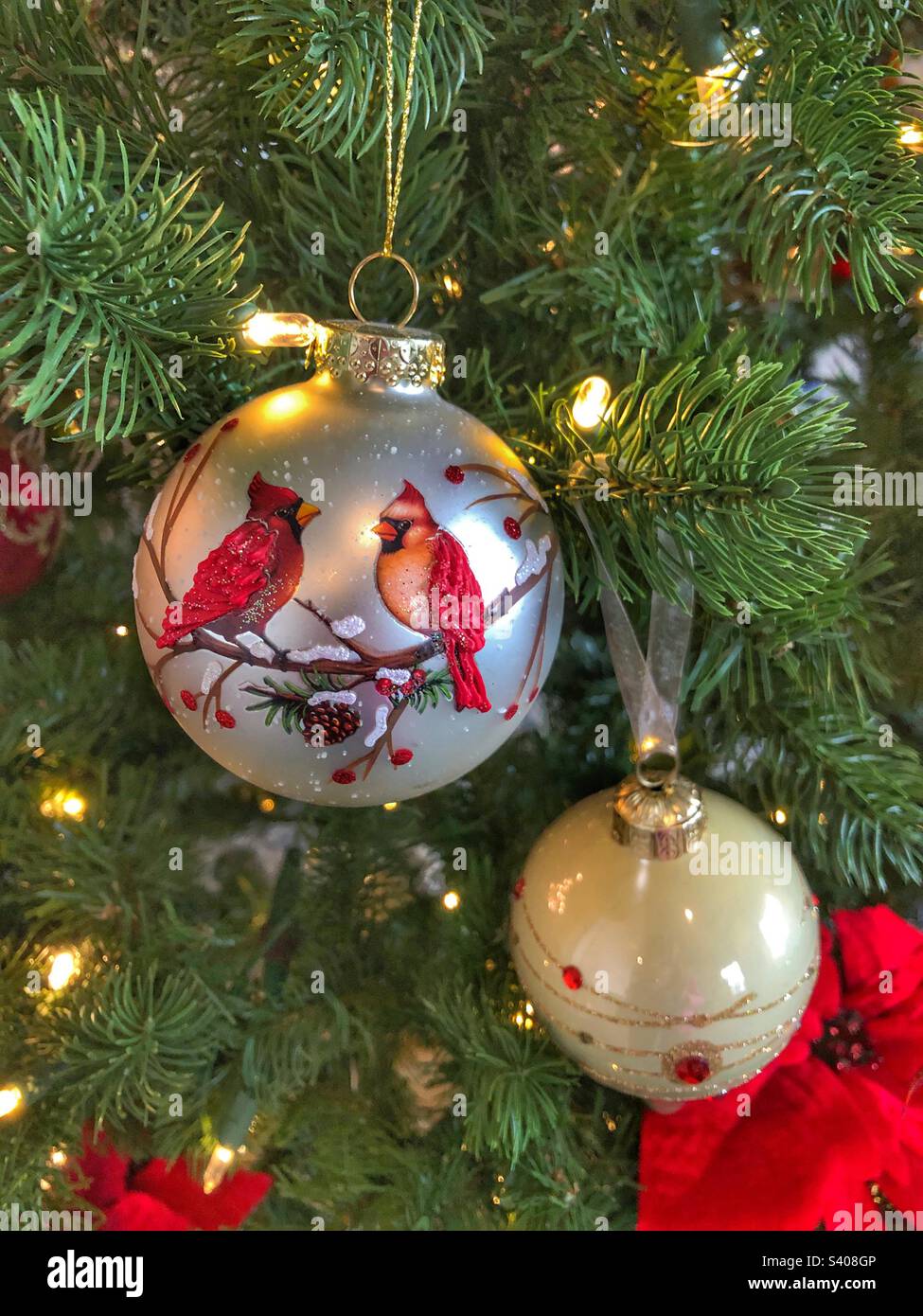 Christmas ornaments hanging in a tree. - Smartphone Captured Stock Image