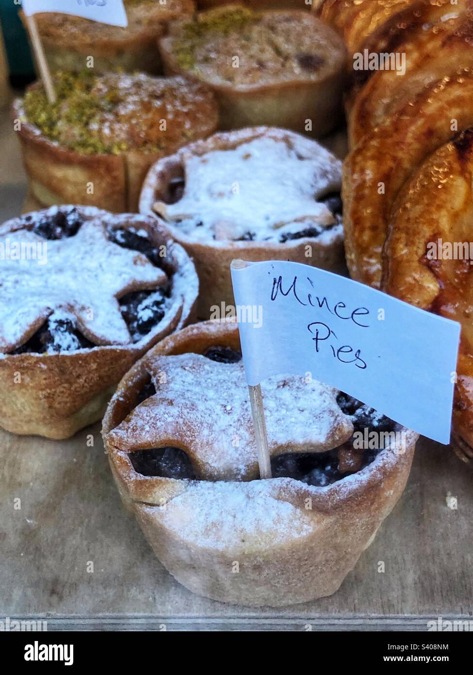 Christmas Mince pie in bakery shop window - Smartphone Captured Stock Image