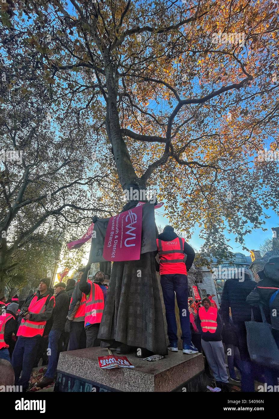 Postal workers attending a strike rally in Parliament Square London SW1 December 2022 called by Communications Workers Union trade union (CWU) - Smartphone Captured Stock Image