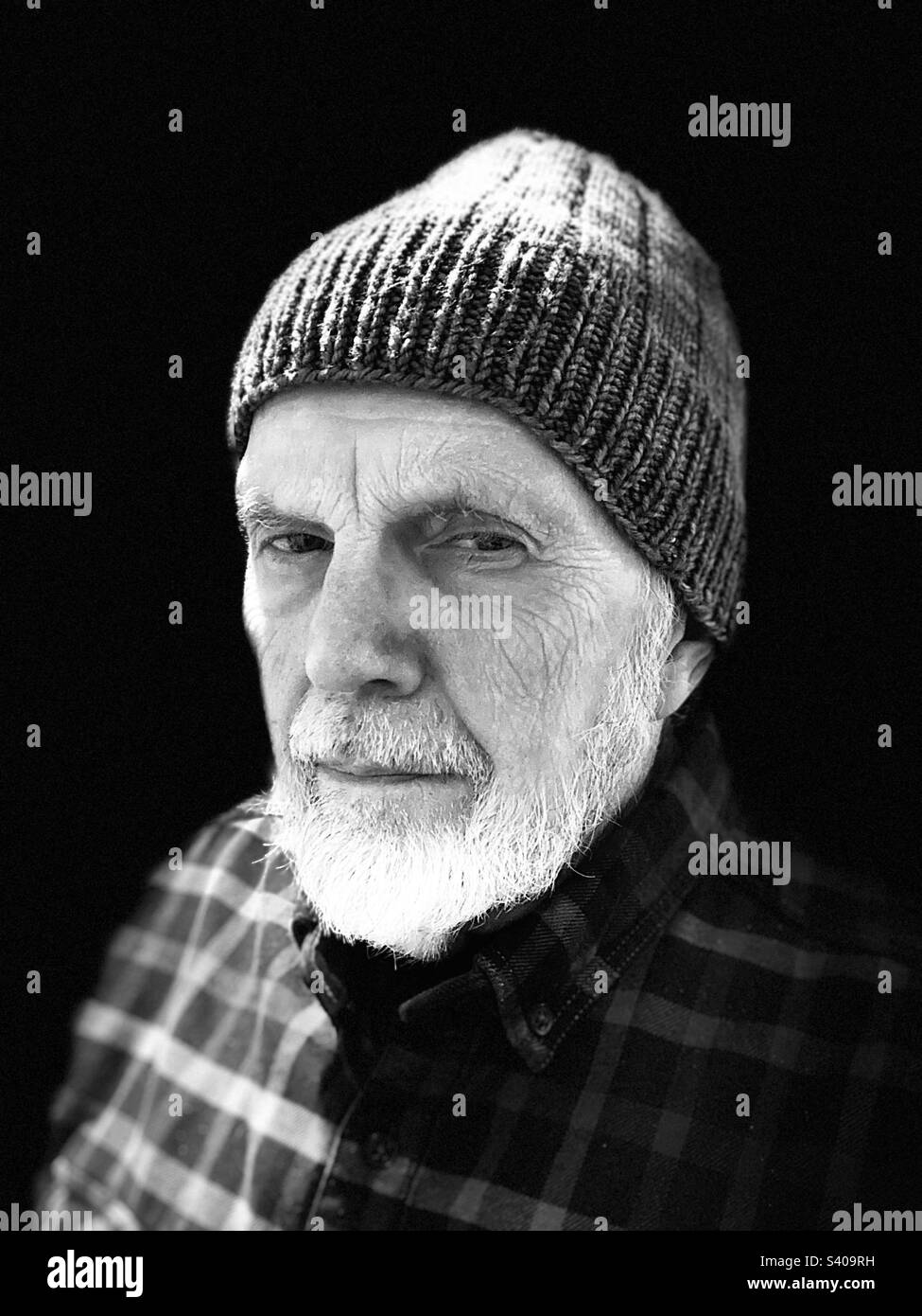 Old man with hat, in black and white Stock Photo