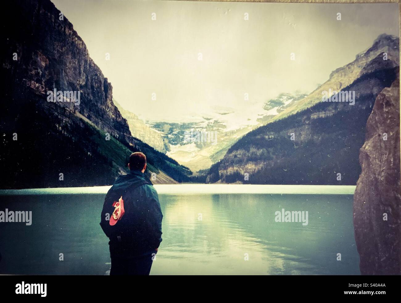 Me taking in the magnificent Lake Louise. - Smartphone Captured Stock Image