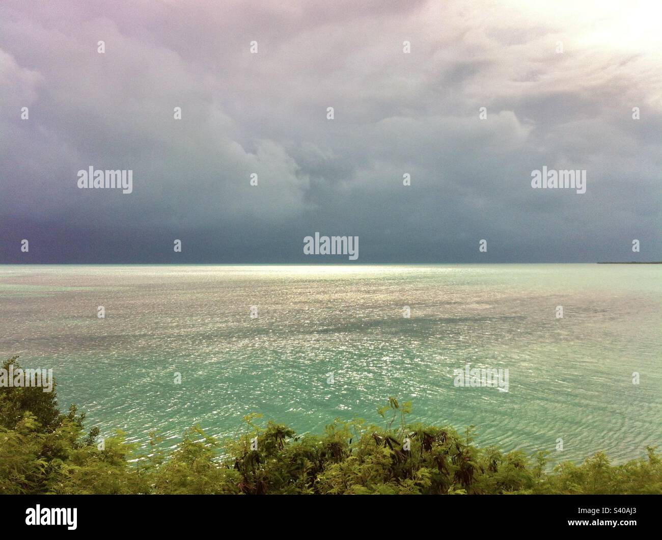 Storm clouds over the mangroves and ocean of the Florida Keys Stock Photo