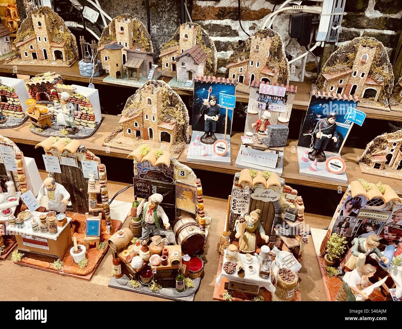 Hand made nativity figurines, Naples, Via San Gregorio Armeno a picturesque alley in the heart of city - Smartphone Captured Stock Image