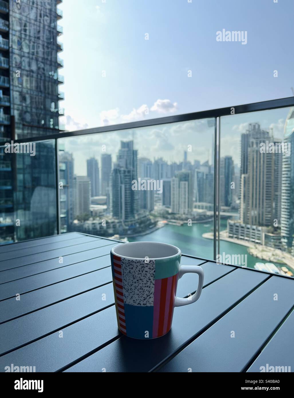 A hot cup of coffee in the middle of a concrete jungle - Smartphone Captured Stock Image