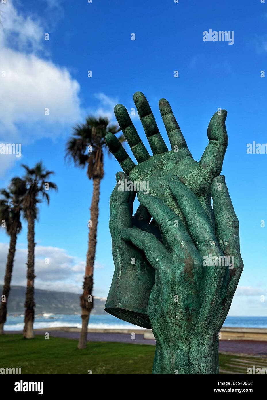 Giant Hands Sculpture on the Atlantic coast at Las Palmas - a memorial. - Smartphone Captured Stock Image