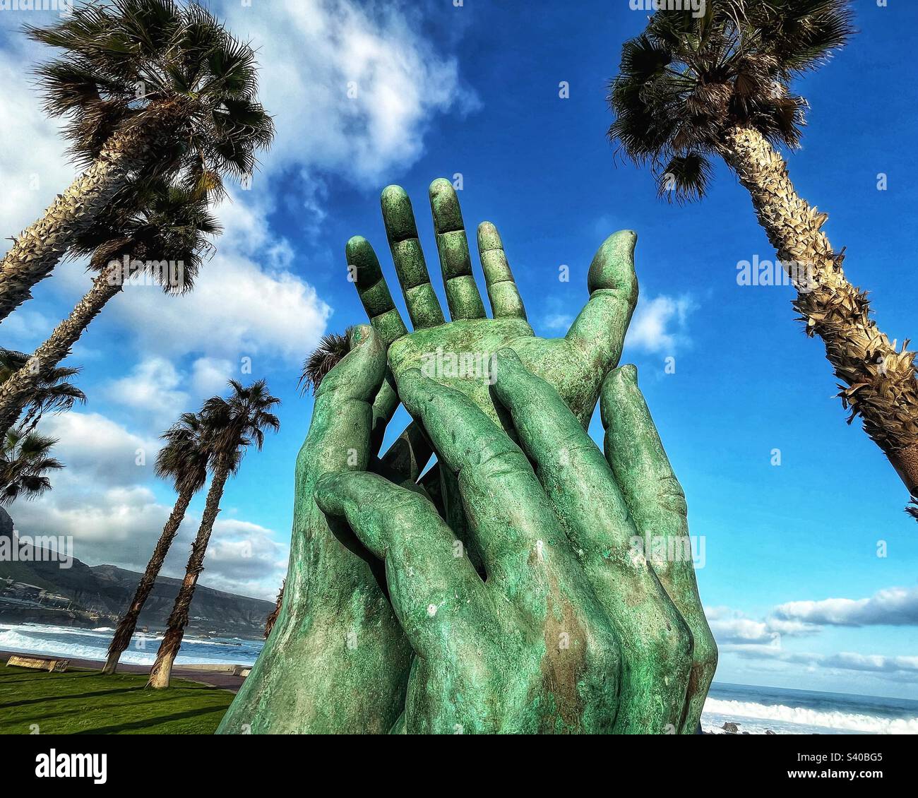 Giant Hand Sculpture memorial in Las Palmas, Gran Canaria - Smartphone Captured Stock Image