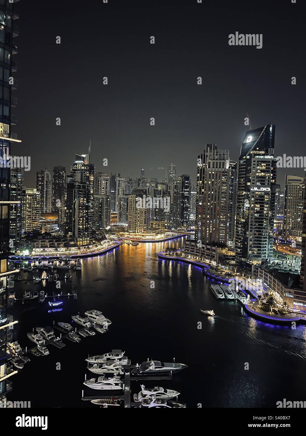 Beautiful and colorful skyline of Dubai Marina at night - Smartphone Captured Stock Image