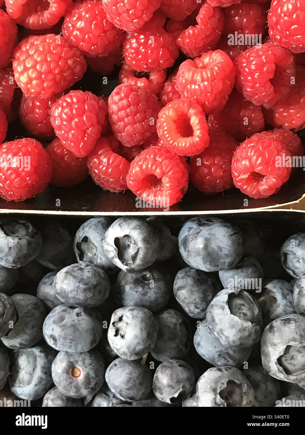 Raspberries and blueberries Stock Photo