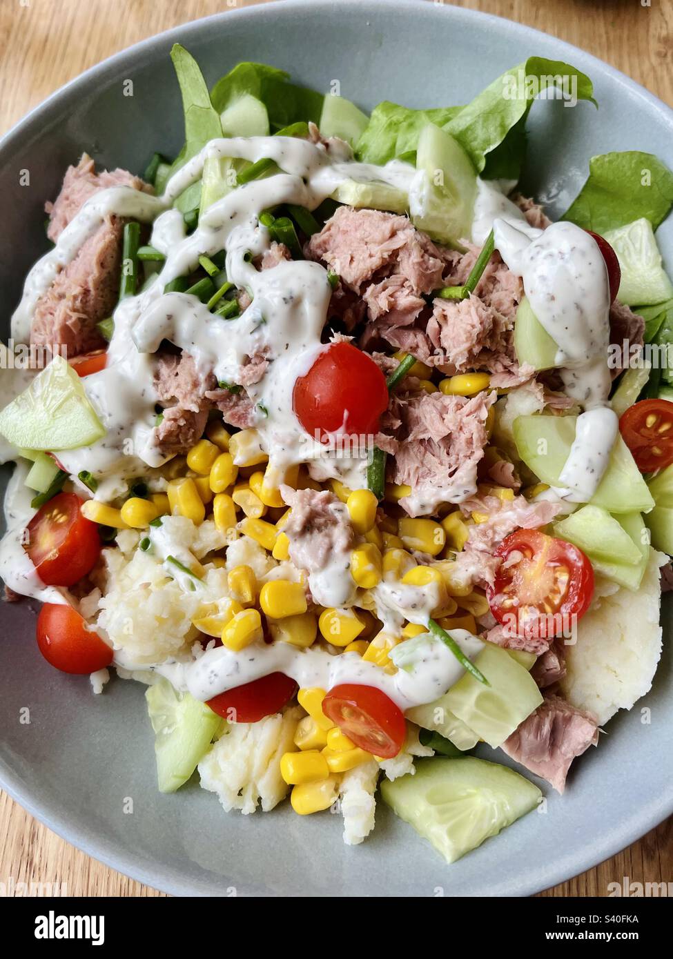 Tuna salad with dressing Stock Photo Alamy