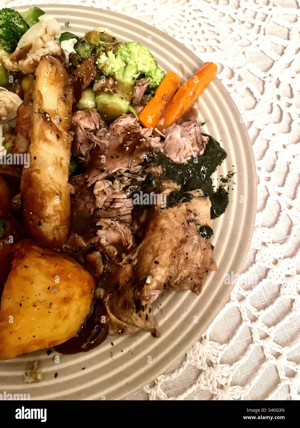 Slow cooked lamb roast dinner Stock Photo Alamy
