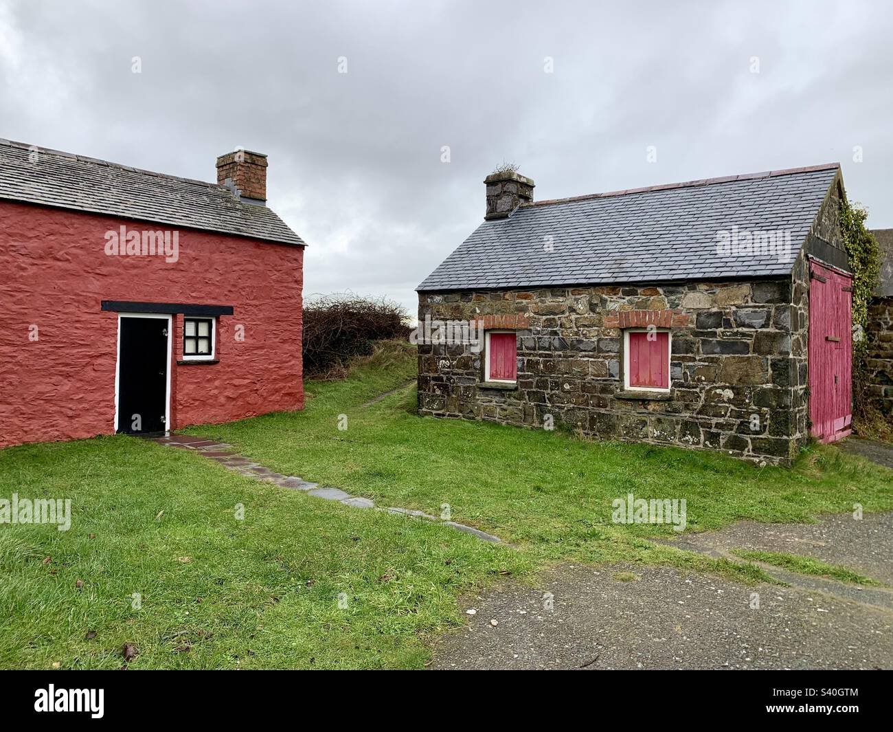Red and brick derelict cottages - Smartphone Captured Stock Image