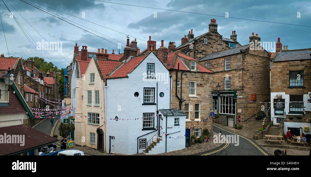 Picturesque streets of Robin Hoods Bay village in the North York Moors National Park, UK - Smartphone Captured Stock Image