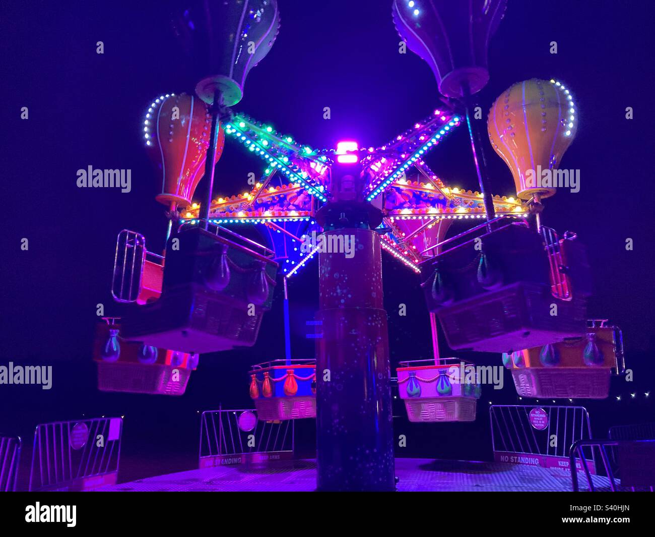 All the fun of the fair. Hot air balloon ride at night Stock Photo Alamy