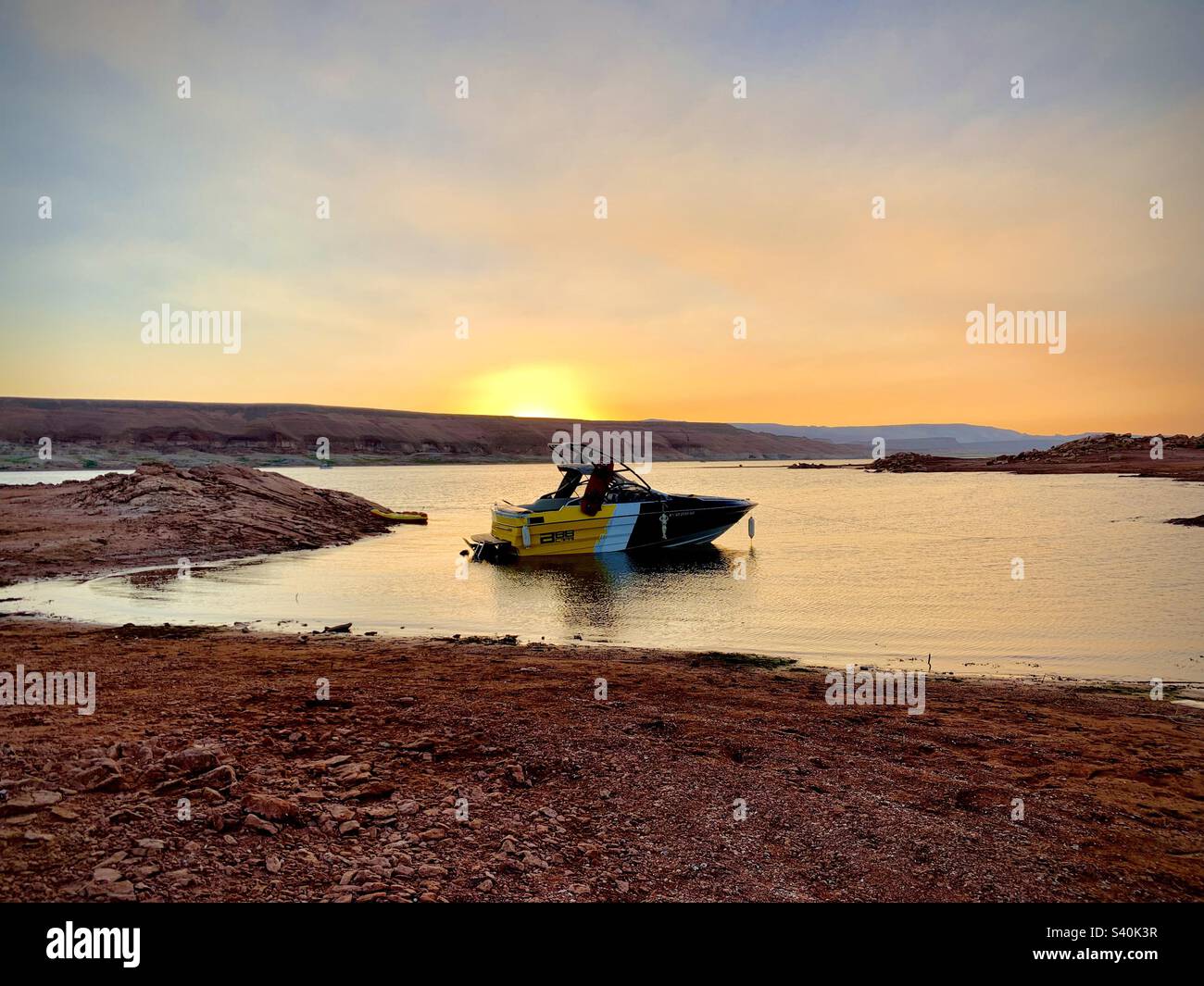 Sunset Wakeboarding Boat Stock Photo