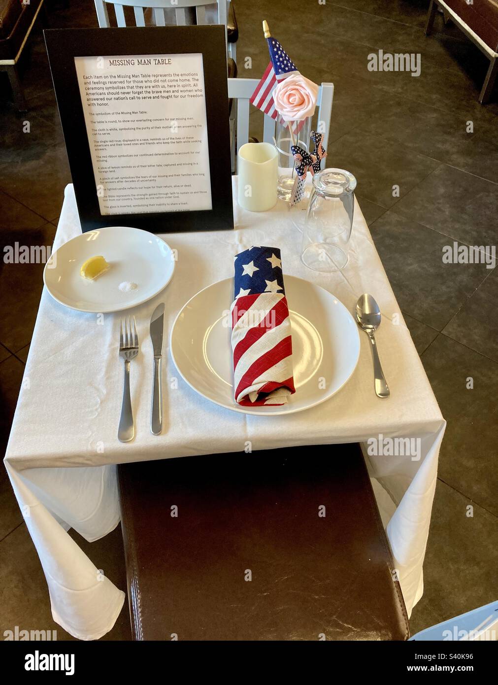 Picture of the “missing man table” representing armed forces Mia soldiers Stock Photo