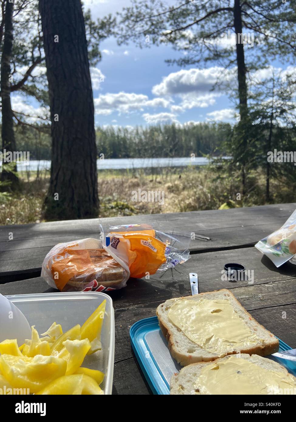 Breakfast on campsite, sunny morning by the Pilu lake in Latvia - Smartphone Captured Stock Image