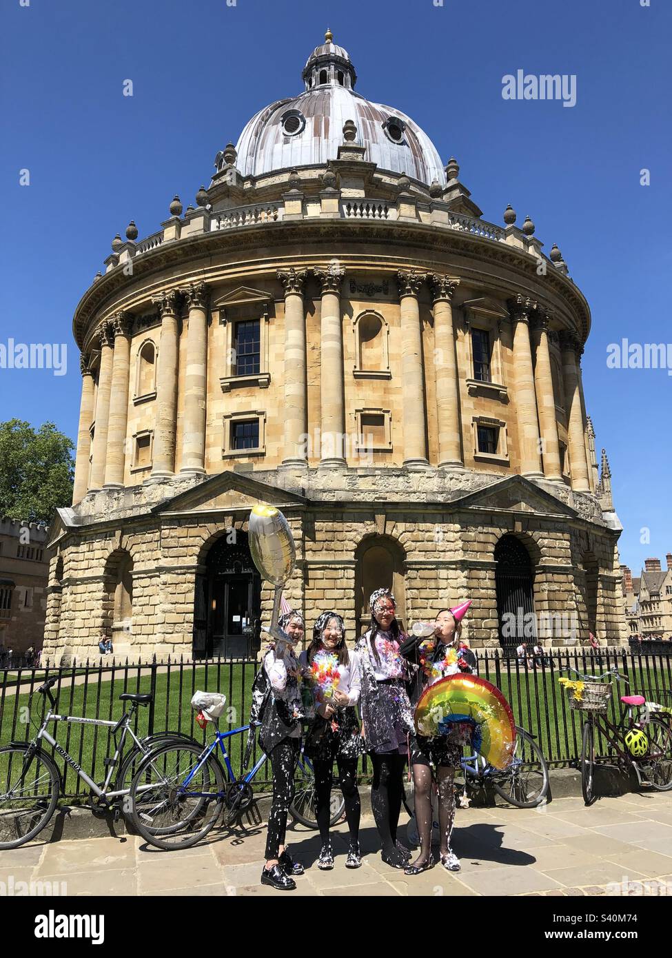 Oxford Graduation Students Celebrating outside the Radcliffe Camera in