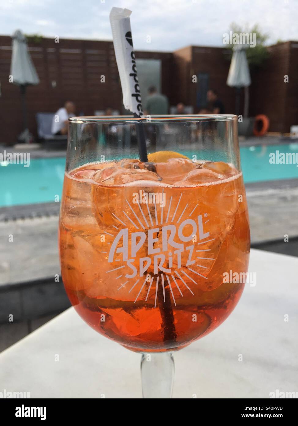 Aperol Spritz cocktail by the pool Stock Photo - Alamy