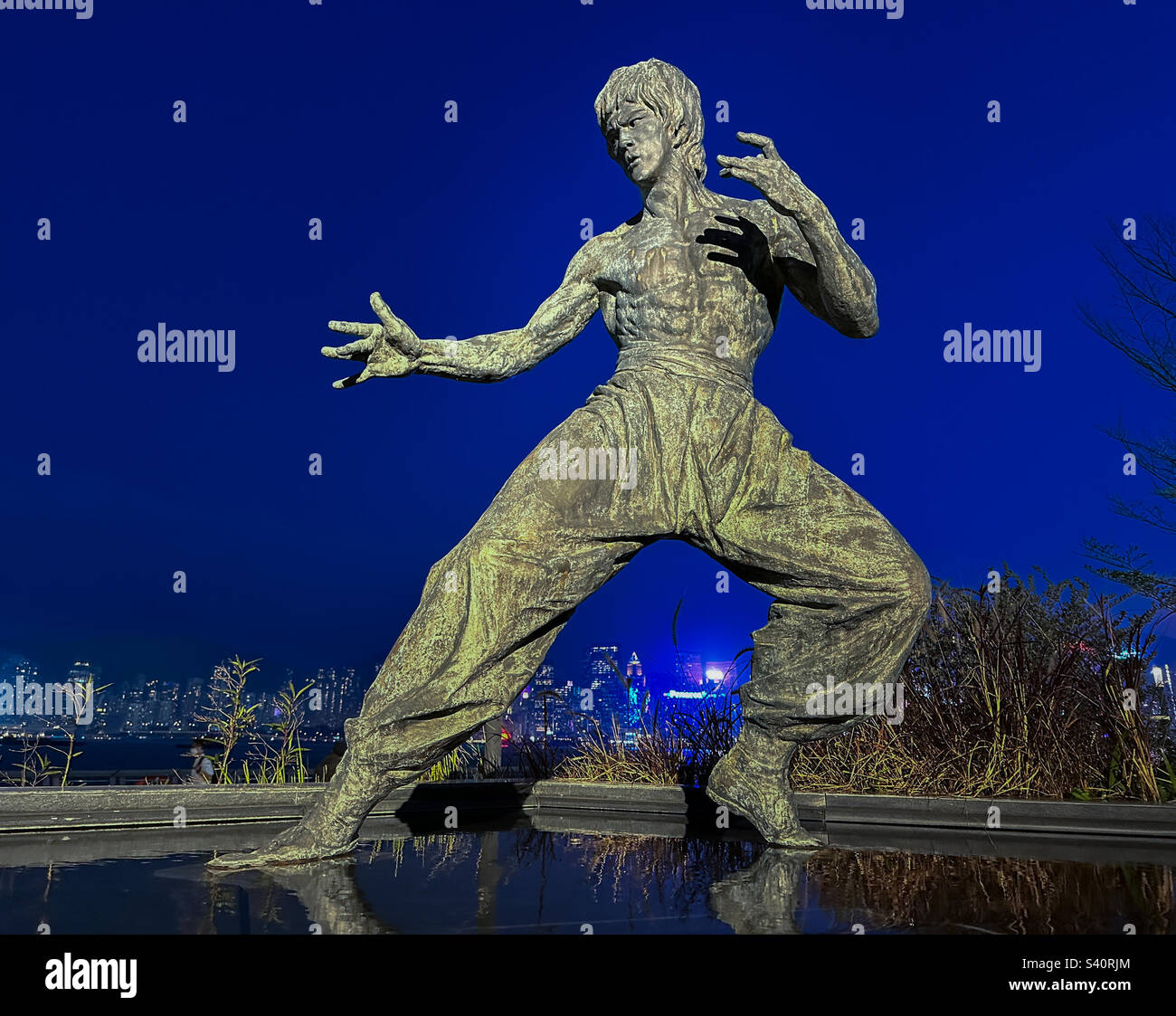 Statue of kung fu legend and movie star Bruce Lee on the Avenue of the Stars in Hong Kong Stock Photo