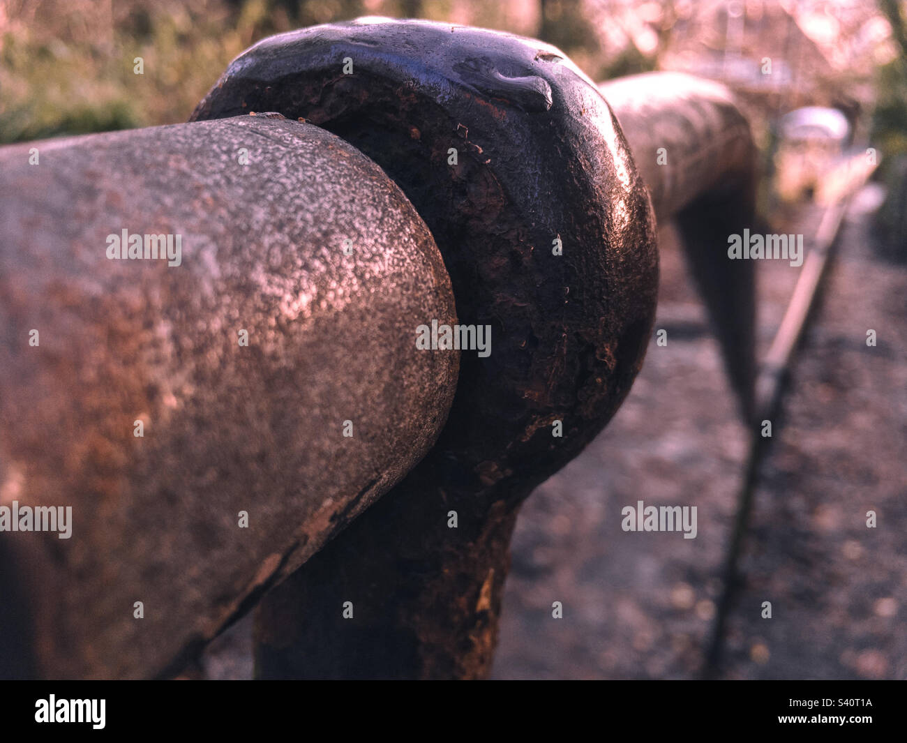 Closeup of  rusty handrail descending down steps - Smartphone Captured Stock Image